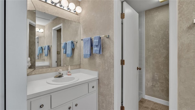 bathroom featuring vanity and tile patterned flooring