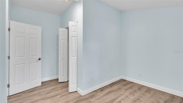 unfurnished bedroom featuring light hardwood / wood-style floors