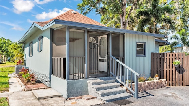 exterior space featuring central AC unit