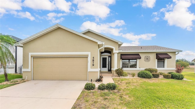 ranch-style house with a front yard and a garage