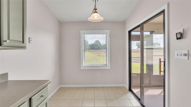 doorway featuring light tile patterned floors