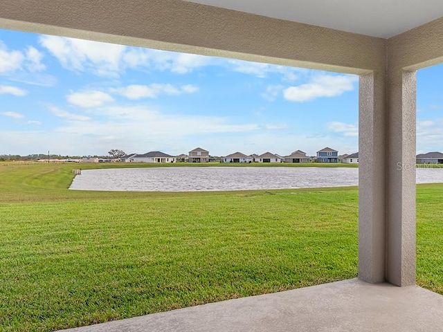 view of yard featuring a water view