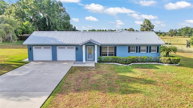 6110 Downing St, Dover, FL 33527 - ranch-style home with stucco siding, a garage, a metal roof, and concrete driveway
