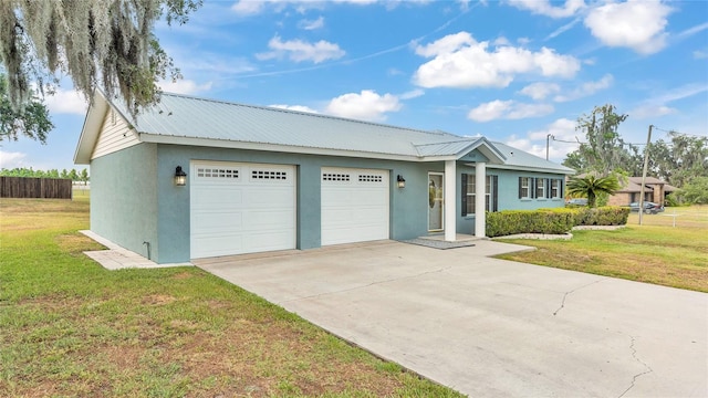 6110 Downing St, Dover, FL 33527 - ranch-style home featuring stucco siding, a garage, concrete driveway, and a metal roof