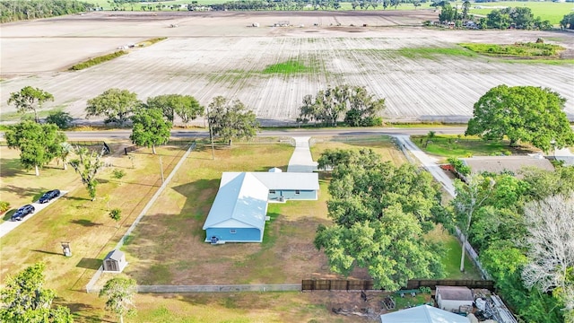 birds eye view of property featuring a rural view