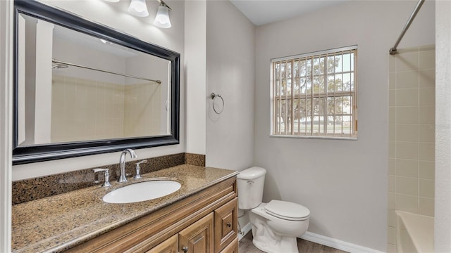 full bathroom featuring vanity,  shower combination, toilet, and wood-type flooring