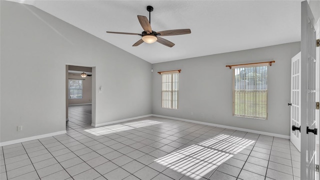 6110 Downing St, Dover, FL 33527 - empty room with healthy amount of natural light, a ceiling fan, lofted ceiling, and light tile patterned floors