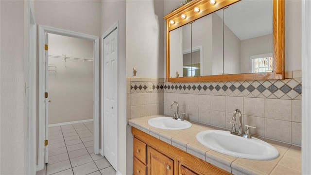 6110 Downing St, Dover, FL 33527 - full bath with tile patterned flooring, double vanity, and a walk in closet