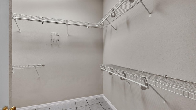 6110 Downing St, Dover, FL 33527 - spacious closet featuring light tile patterned floors
