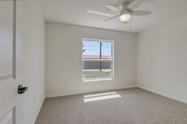 unfurnished room featuring carpet flooring and ceiling fan