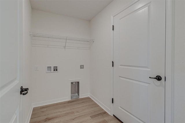 washroom featuring hookup for an electric dryer, hookup for a washing machine, and light hardwood / wood-style flooring