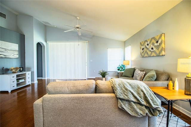 living room featuring lofted ceiling, dark hardwood / wood-style floors, and ceiling fan