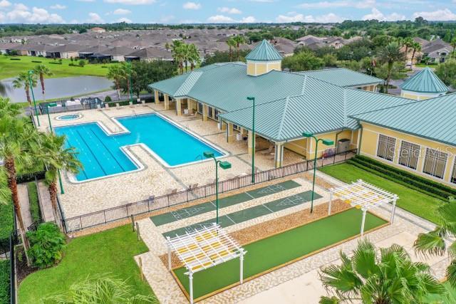 view of swimming pool with a water view