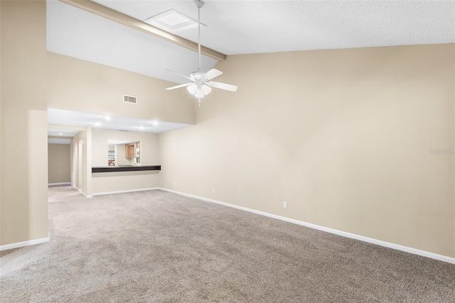 unfurnished living room featuring ceiling fan, high vaulted ceiling, carpet, a textured ceiling, and beamed ceiling