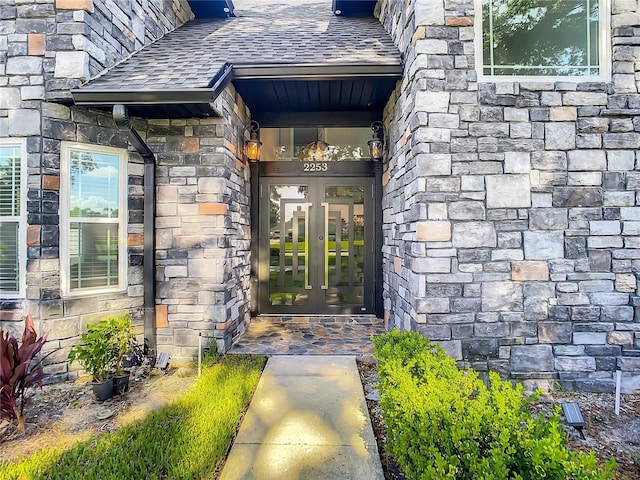 entrance to property featuring french doors