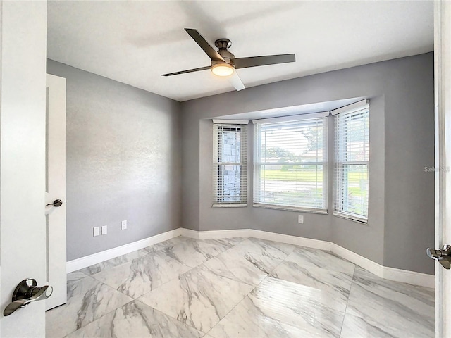 empty room with ceiling fan