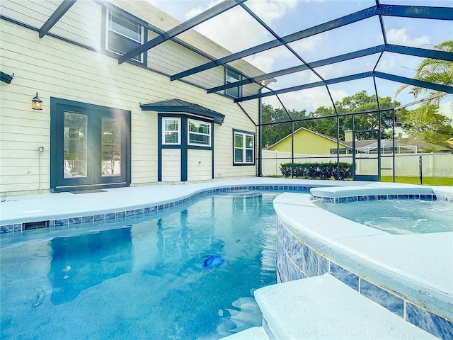 view of swimming pool with a lanai