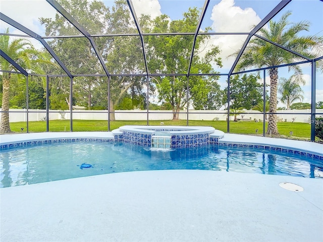 view of pool featuring an in ground hot tub, a lanai, and a yard