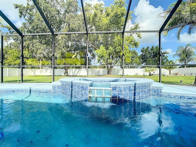 view of pool with an in ground hot tub and glass enclosure