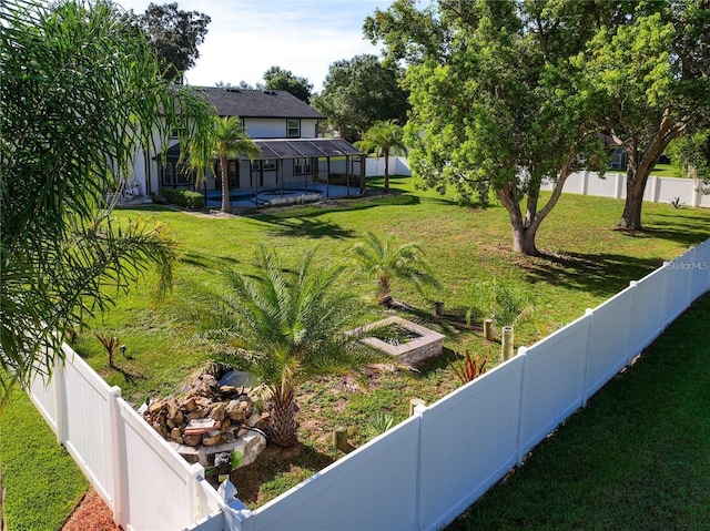 view of yard featuring a lanai