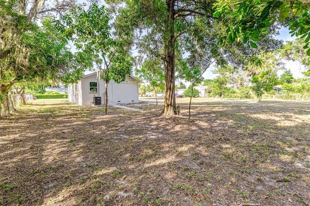 view of yard featuring central AC unit