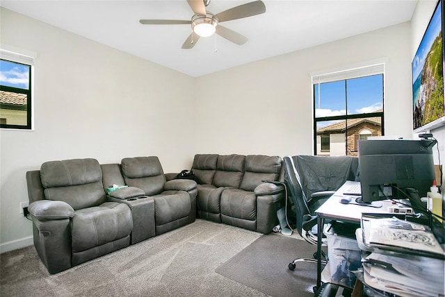 home office featuring ceiling fan and carpet floors