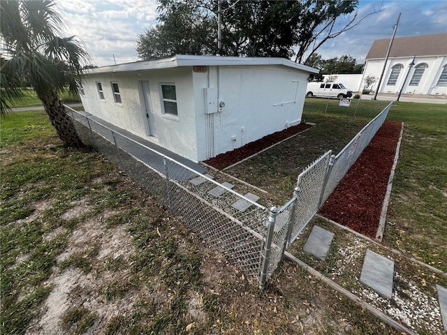 view of property exterior featuring a yard