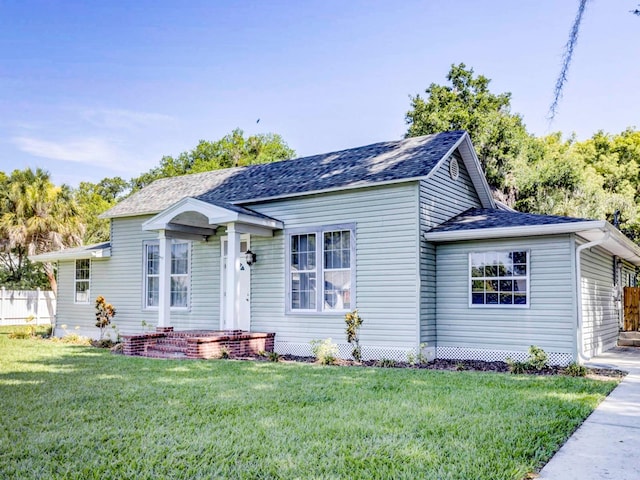 view of front of home with a front yard