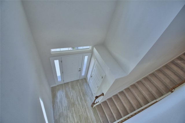 foyer entrance featuring wood finished floors