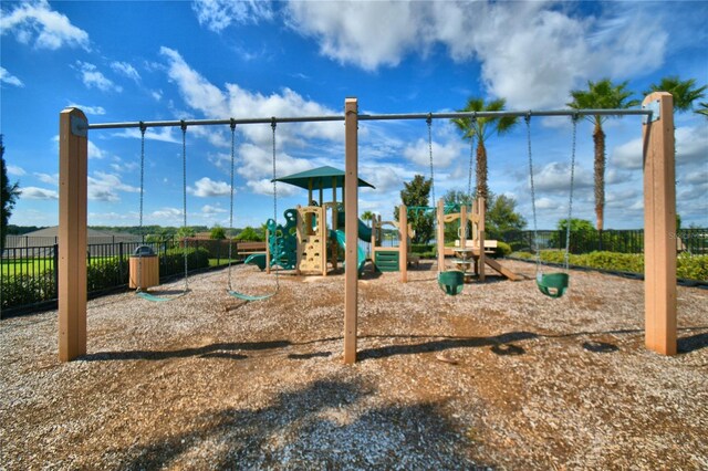 community play area featuring fence
