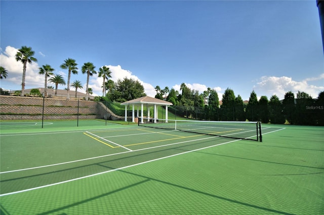 view of sport court featuring community basketball court and fence