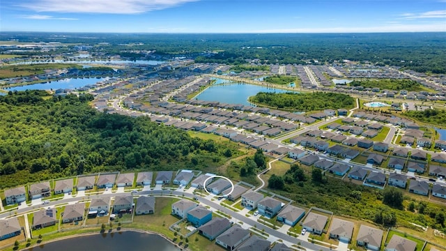 aerial view featuring a water view and a residential view