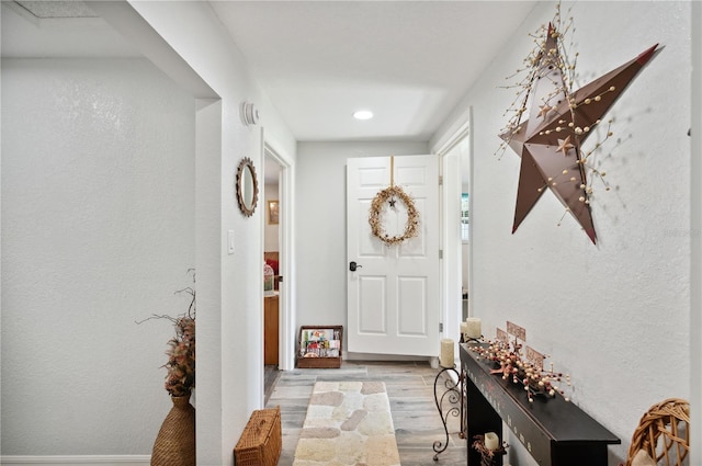 foyer with light hardwood / wood-style floors