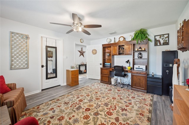 office featuring ceiling fan and dark hardwood / wood-style flooring