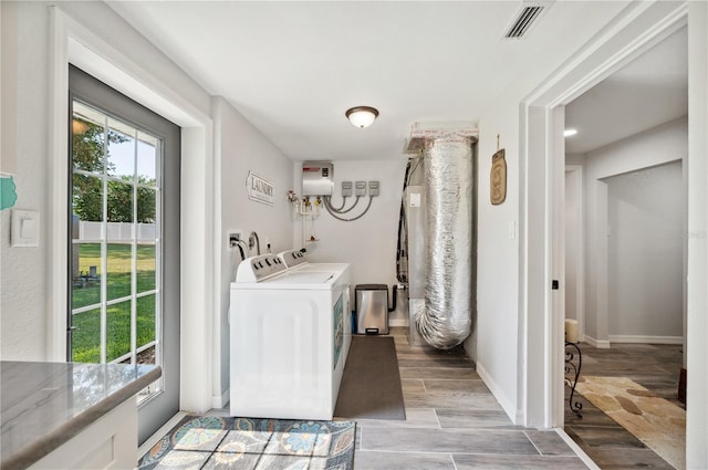 laundry area with washer and clothes dryer