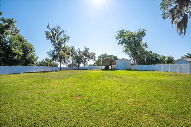 view of yard featuring a carport