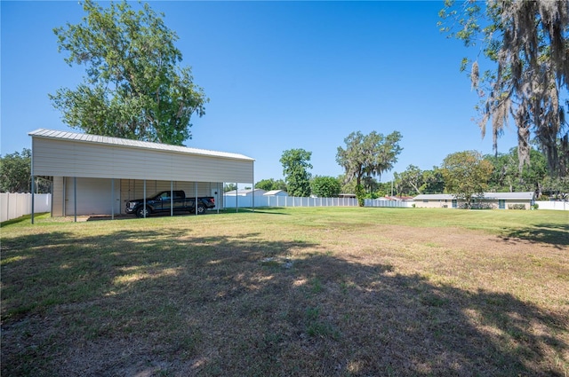 view of yard featuring a carport