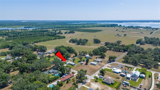 bird's eye view with a water view and a rural view