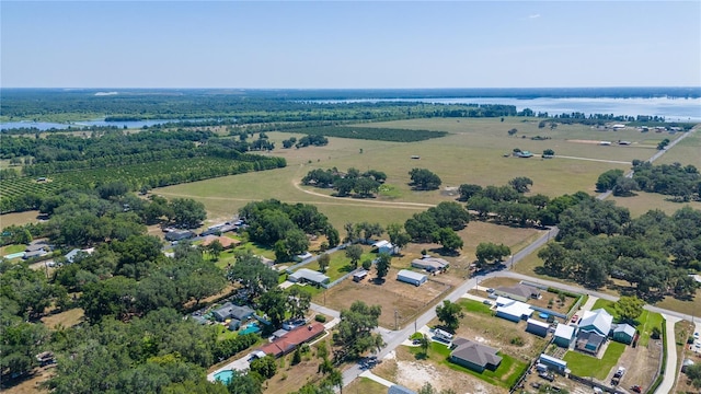 aerial view featuring a rural view and a water view