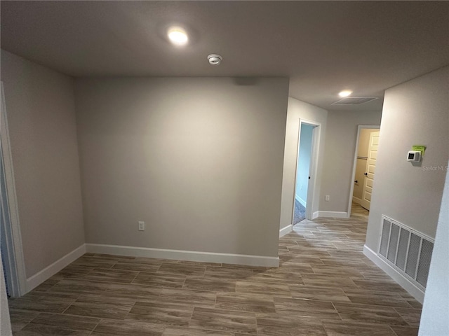 unfurnished room featuring dark hardwood / wood-style floors