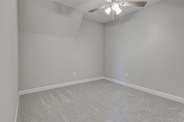 unfurnished room featuring carpet and ceiling fan