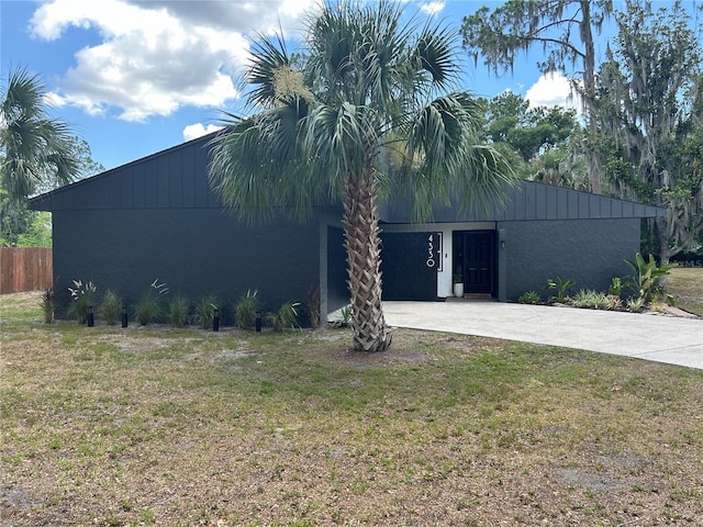 view of home's exterior featuring a yard