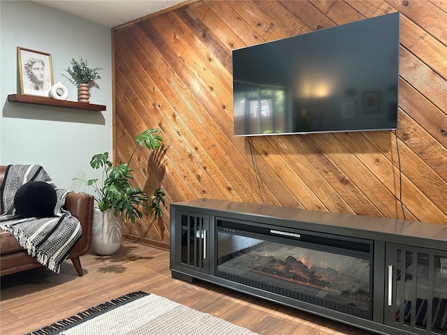 room details with wooden walls and wood-type flooring