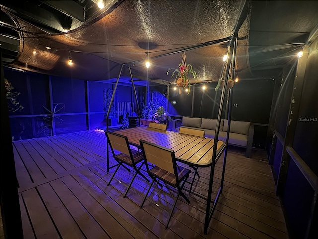 wooden terrace featuring an outdoor hangout area