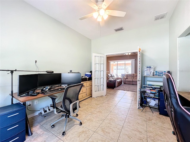 tiled home office with french doors and ceiling fan