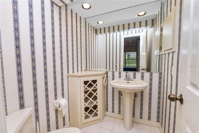 bathroom with tile patterned flooring