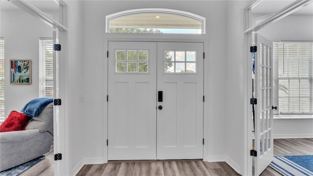 foyer with light hardwood / wood-style flooring