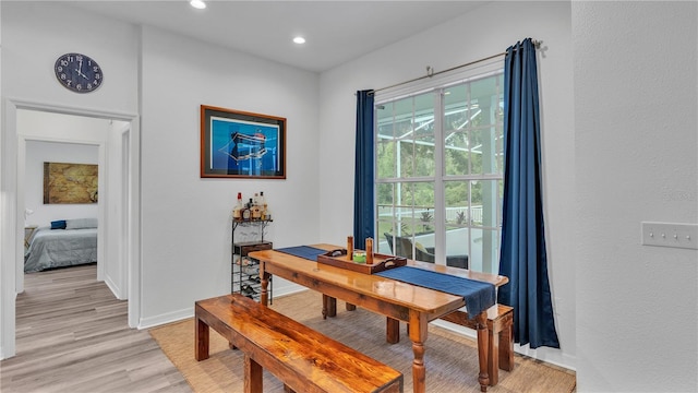 dining area featuring light wood-type flooring