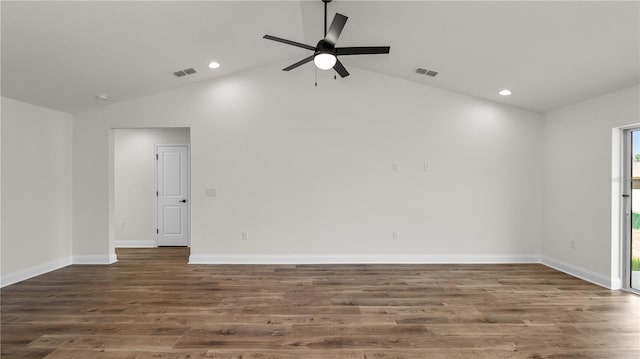 unfurnished room featuring lofted ceiling, ceiling fan, and dark hardwood / wood-style floors