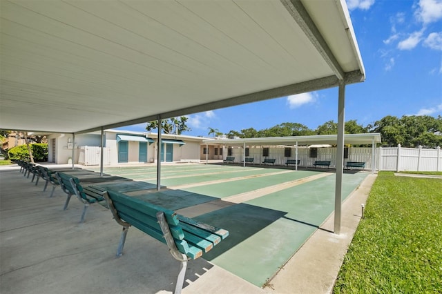 view of community featuring a yard